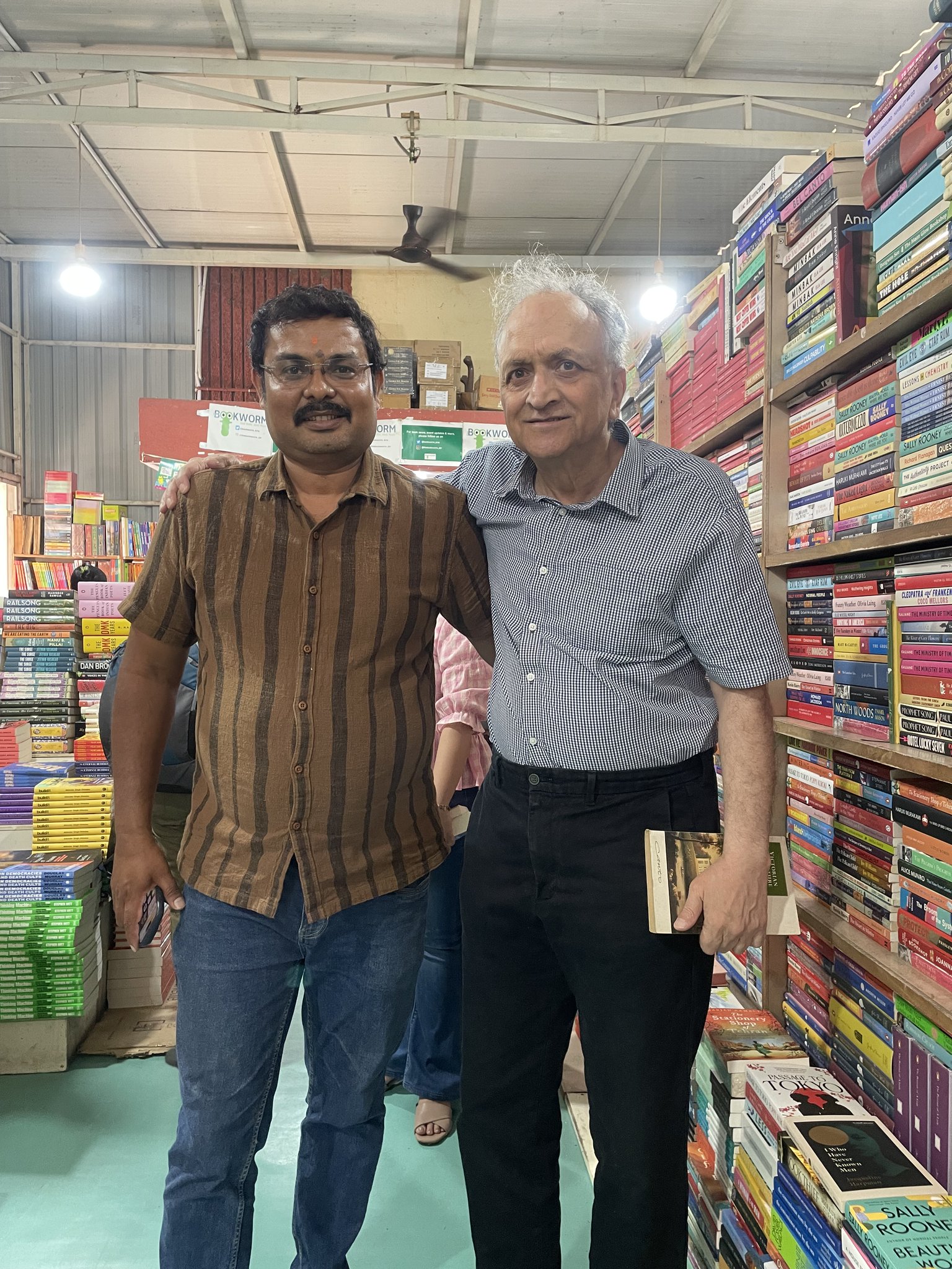 Customers browsing inside Bookworm bookstore after the flood