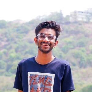 Ashutosh  Nakum - Visual Designer & Copywriter